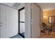 Condo entrance featuring an open door and neutral interior at 523 Spring Lakes Blvd, Bradenton, FL 34210