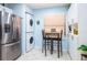Eat-in kitchen features stainless steel appliances, washer and dryer, and modern finishes at 523 Spring Lakes Blvd, Bradenton, FL 34210
