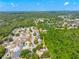 Charming single Gathering home, offers a serene wooded setting and verdant surroundings at 5623 Wilde Oak Way, Sarasota, FL 34232