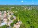 Charming single Gathering home, offers a serene wooded setting and verdant surroundings at 5623 Wilde Oak Way, Sarasota, FL 34232