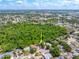A desirable home in a tranquil setting, surrounded by lush greenery and mature trees at 5623 Wilde Oak Way, Sarasota, FL 34232