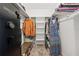 Walk-in closet with shelving, hanging storage, and a built-in safe at 5623 Wilde Oak Way, Sarasota, FL 34232