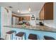 Enjoy this kitchen with stainless steel appliances and granite countertops with a breakfast bar at 5623 Wilde Oak Way, Sarasota, FL 34232