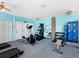 Community fitness center featuring modern equipment, lockers, and bright interior design at 5729 Garden Lakes Palm, Bradenton, FL 34203