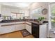 Kitchen with ample cabinet space, sleek countertops, and modern appliances, ideal for cooking enthusiasts at 5729 Garden Lakes Palm, Bradenton, FL 34203
