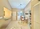 Charming breakfast nook with tile flooring, display cabinets, and a cozy dining set at 5810 Garden Lakes Palm, Bradenton, FL 34203