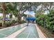Shuffleboard courts with blue canopy at 5810 Garden Lakes Palm, Bradenton, FL 34203