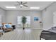 Relaxing area with comfortable chair, natural light, and serene decor. Perfect for unwinding and enjoying peaceful moments at 5810 Garden Lakes Palm, Bradenton, FL 34203