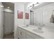 Bathroom featuring a double vanity, framed mirror, and a shower with curtain at 5823 Title Row Dr, Bradenton, FL 34210