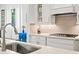 Modern kitchen featuring a large island and quartz countertop at 5823 Title Row Dr, Bradenton, FL 34210