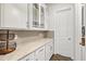 Pantry with quartz countertop and cabinets at 5823 Title Row Dr, Bradenton, FL 34210