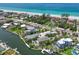 Waterfront living at its finest, featuring Gulf views and direct ocean access from private docks at 5920 Gulf Of Mexico Dr, Longboat Key, FL 34228