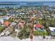 Aerial view showing the home's location in proximity to community deeded beach access at 5920 Gulf Of Mexico Dr, Longboat Key, FL 34228