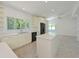 Spacious kitchen with island, modern appliances, and bright, open layout, ideal for cooking and gatherings at 5920 Gulf Of Mexico Dr, Longboat Key, FL 34228