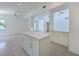 Beautifully renovated kitchen with island and ample storage space connects seamlessly to the living area at 5920 Gulf Of Mexico Dr, Longboat Key, FL 34228