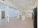 Open-concept kitchen with white cabinets, stainless appliances and island, perfect for entertaining at 5920 Gulf Of Mexico Dr, Longboat Key, FL 34228