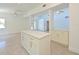 Bright kitchen with large island, perfect for cooking and entertaining in this open-concept layout at 5920 Gulf Of Mexico Dr, Longboat Key, FL 34228