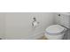 Close-up of toilet and paper holder at 5987 Snowy Egret Dr, Sarasota, FL 34238