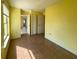 Bright and airy bedroom with tile flooring and ample closet space at 6113 Mckee St, Port Charlotte, FL 33981