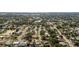 Wide aerial view of residential neighborhood surrounded by trees at 6512 Bowline Dr, Sarasota, FL 34231