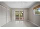 Bedroom featuring a sliding door to the outdoor patio at 6512 Bowline Dr, Sarasota, FL 34231