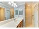 Spacious bathroom featuring a long vanity with double mirrors and a separate shower at 6519 Grand Estuary Trl # 107, Bradenton, FL 34212