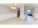 Cozy dining nook with waterfront views and stylish breakfast bar seating at 6519 Grand Estuary Trl # 107, Bradenton, FL 34212