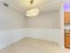 Inviting dining area with wainscoting, pendant lighting and easy access to the kitchen at 6519 Grand Estuary Trl # 107, Bradenton, FL 34212