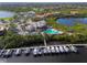 Picturesque aerial view of the community, marina, and waterfront setting at 661 Foggy Morn Ln, Bradenton, FL 34212