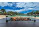 Community pool fire pit, a cozy spot to enjoy an evening by the water at 661 Foggy Morn Ln, Bradenton, FL 34212
