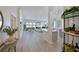 Open living space with views into the kitchen and out to the backyard at 661 Foggy Morn Ln, Bradenton, FL 34212