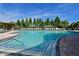 Inviting community pool with shallow entry, stairs and handrail at 661 Foggy Morn Ln, Bradenton, FL 34212