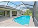 Inviting screened-in pool area with clear blue water and an adjacent patio seating area at 661 Foggy Morn Ln, Bradenton, FL 34212