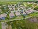 A beautiful aerial view of a residential community with screened-in pools and well-maintained streets at 6764 Hickory Hammock Cir, Bradenton, FL 34202