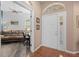 Inviting foyer featuring tile floors with an office visible through the doorway at 6764 Hickory Hammock Cir, Bradenton, FL 34202