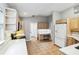 Bright kitchen featuring updated appliances, custom cabinets, and a convenient built-in desk area at 7 Arbor Oaks Dr, Sarasota, FL 34232
