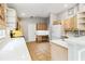 Spacious kitchen offers quartz countertops, built-in desk, and ample cabinet space at 7 Arbor Oaks Dr, Sarasota, FL 34232