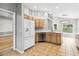 Spacious kitchen with modern appliances, ample counter space, and tile flooring at 7 Arbor Oaks Dr, Sarasota, FL 34232