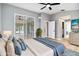 Spacious main bedroom with access to sunroom, and ensuite bathroom at 7 Arbor Oaks Dr, Sarasota, FL 34232