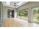 Spacious sunroom with large windows and tile flooring, offering a bright and airy atmosphere at 7 Arbor Oaks Dr, Sarasota, FL 34232