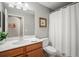 Bathroom featuring neutral walls and a white shower curtain at 7005 River Hammock Dr # 206, Bradenton, FL 34212