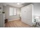 Bedroom showcasing a Murphy bed and contemporary furnishings at 7005 River Hammock Dr # 206, Bradenton, FL 34212