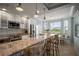 Spacious kitchen featuring stainless appliances, granite countertops, an eat-in bar, and a breakfast nook at 7005 River Hammock Dr # 206, Bradenton, FL 34212