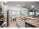 Bright eat-in kitchen with stainless steel appliances and plenty of natural light at 7005 River Hammock Dr # 206, Bradenton, FL 34212