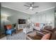 Comfortable living room with stylish furnishings, decor, and a ceiling fan at 7005 River Hammock Dr # 206, Bradenton, FL 34212