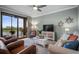 Comfortable living room with stylish furnishings and access to a screened-in lanai at 7005 River Hammock Dr # 206, Bradenton, FL 34212