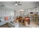 Spacious living room with stylish decor and access to the kitchen at 7005 River Hammock Dr # 206, Bradenton, FL 34212