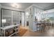 Living space featuring a desk, bar, and kitchen at 7005 River Hammock Dr # 206, Bradenton, FL 34212