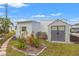 Well maintained backyard with a shed and meticulous landscaping at 720 S Green Cir, Venice, FL 34285