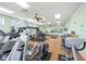Community gym with modern exercise equipment, mirrors, and ample space for workouts at 720 S Green Cir, Venice, FL 34285